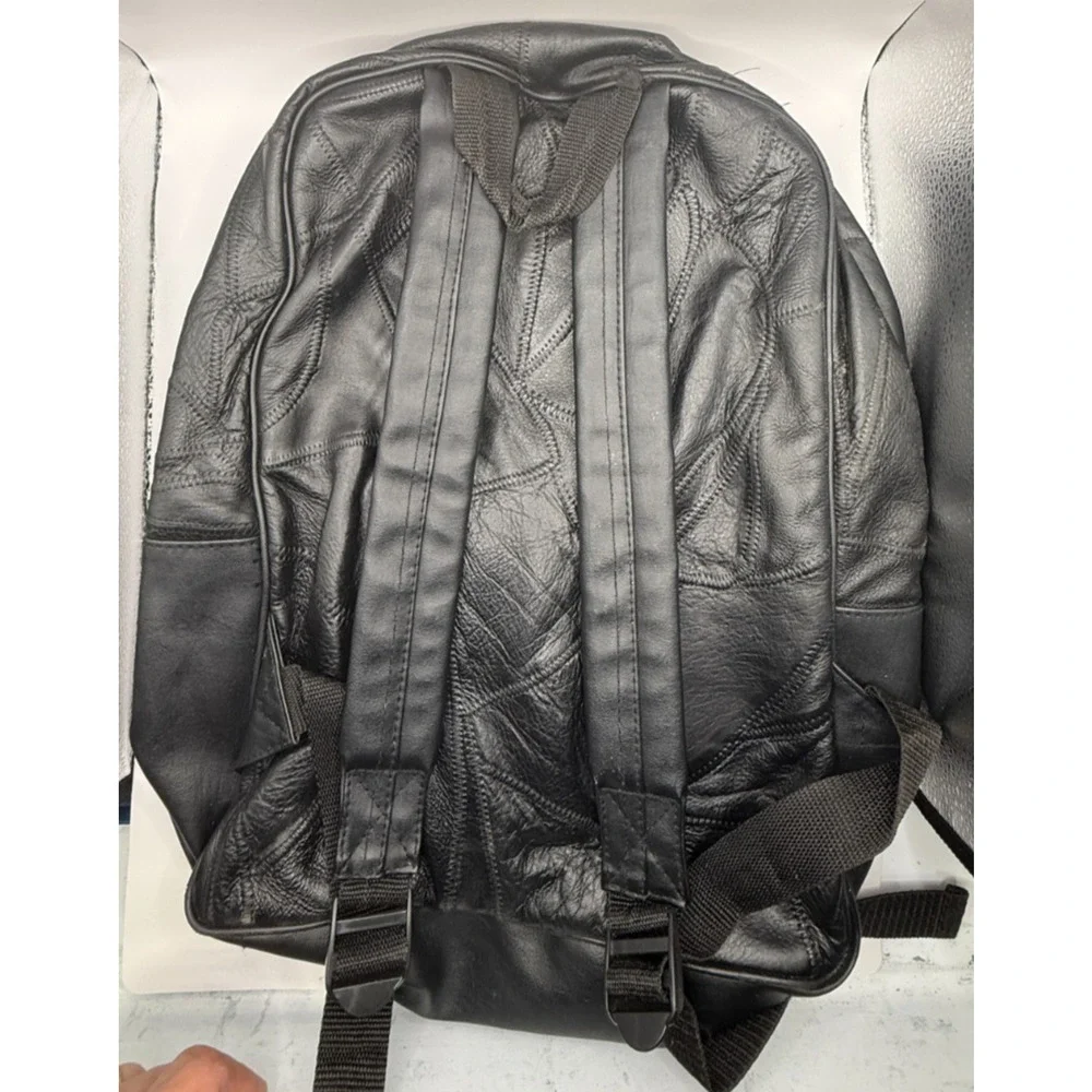 Vintage Patchwork Leather‎ Backpack – Classic Black Travel Bag with Unique Style